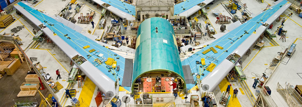 Aircraft wing and fuselage assembly requiring ultrasonic inspection